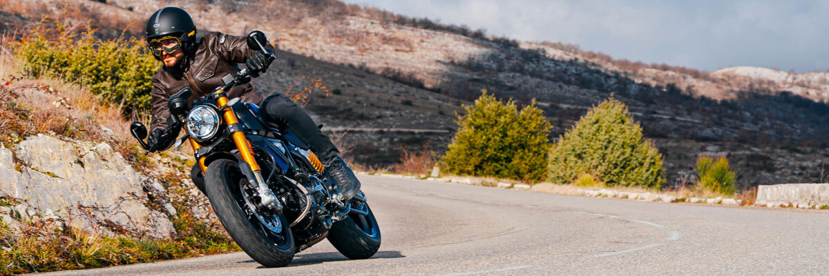 A BMW Motorcycle rider on the way to visit missions in Northern California.